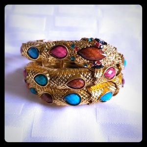 Gold tone wrap around jeweled snake bracelet